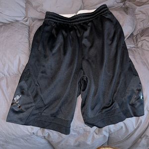 Jordan Boys large basketball shorts with logos on the side. Black.